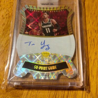 Trae Young- 03/17 Panini Crown Royale Basketball "Regal Achievement" 2020-2021